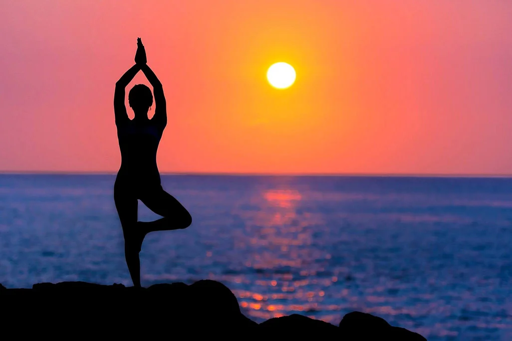 Practice Yoga at beach