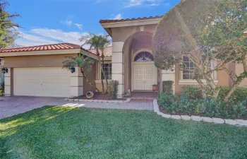 Pavered walkway and driveway to your double door entry!