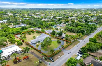 1.14 ACRE 3/3 POOL HOME ON ROBERTS ROAD.
