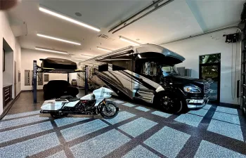 GARAGE 1 OF 3 LARGE ENOUGH ROOM FOR 2 FULL SIZE MOTOR HOME COACHES! HANG TRAILERS FROM CEILING!