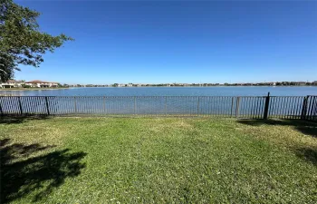 Big fenced lakefront backyard for the kids and your furry friends.  True panoramic Lake Majesty view (facing North).