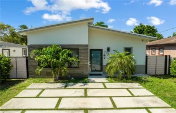Concrete slab driveway, 9 and 10 foot pitched roofs, faces south