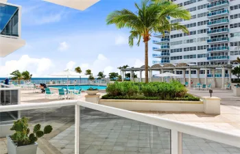 Balcony out to pool deck with ocean views.