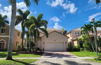 GORGEOUS WATERFRONT HOME SWEET HOME! 4-BEDROOM/3-BATH Front North exposure, paved driveway laced w/ palm trees!