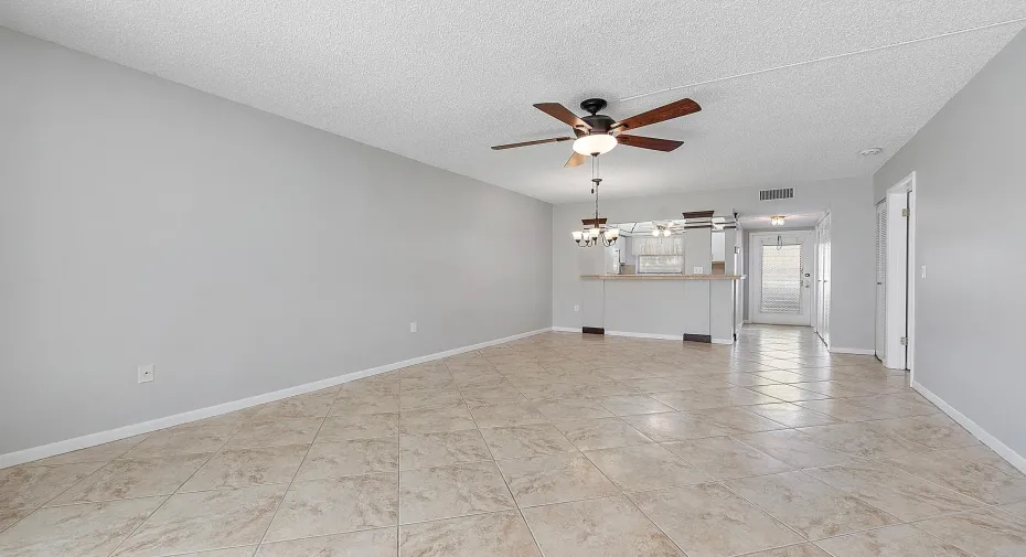 Living and dining room. *Virtually staged to better showcase the true potential of rooms and spaces in the home.