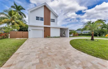 Backyard with low maintenance turf, pool and fountains