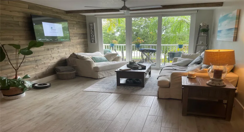 spacious living room with walk out balcony