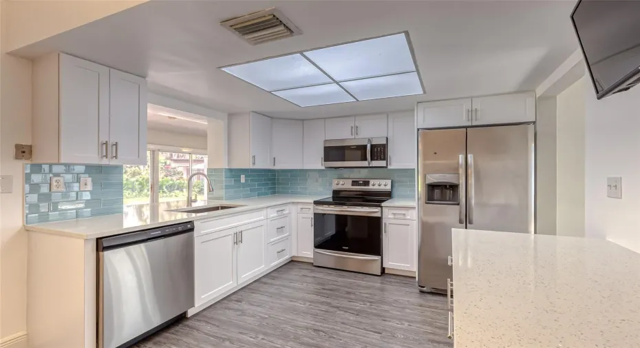 White shaker cabinets with soft-close features