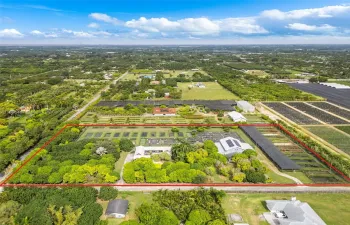 4.5 ACRES 3/2 POOL HOME PLUS BONUS ROOM ON LOWER LEVEL OFF POOL.SERVICE ENTRY LEADS INTO A DBL DECKER CBS WAREHOUSE W/ OFFICE SUITES & BATH THATS APPROX 6200 SQ.FT. GROUNDS CONSIST OF ASST FRUIT, IN GROUND POOLS, THERE ARE NO WATER BILLS OR CITY TAX ON THIS AGRI EXEMPT PROPERTY .