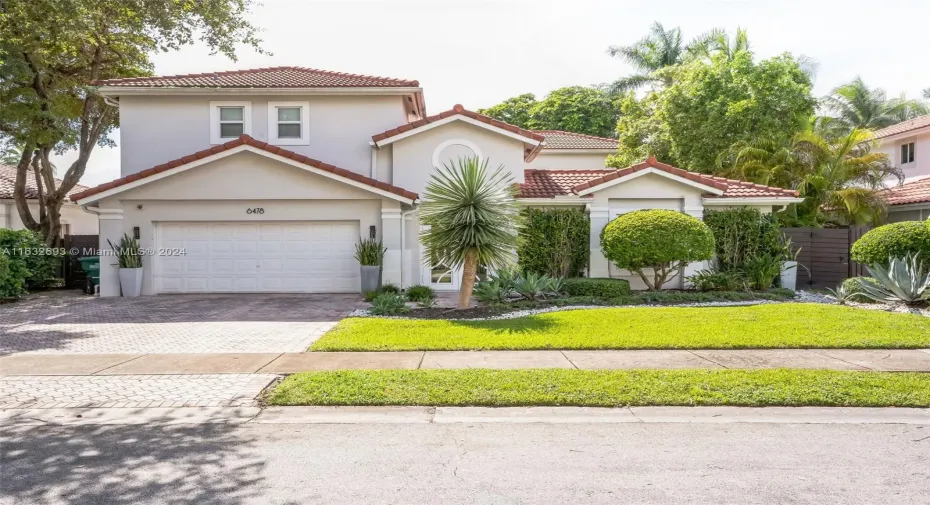 Professionally landscaped front yard