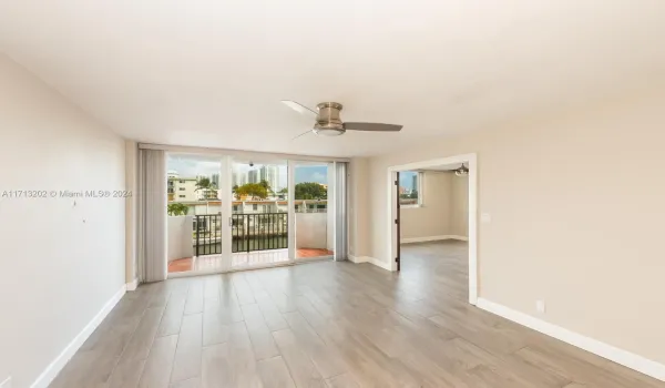 Virtually staged living/dining room from entrance.