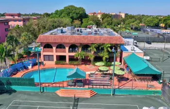 Arial: 2 storied Clubhouse / Pool / Patio are & Patio Bar & Grille