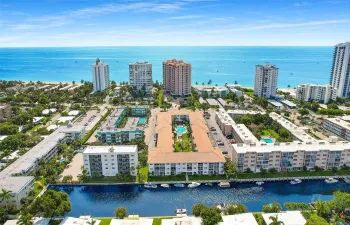 JUST LISTED!!.. A BEACH & BOAT LOVERS DREAM!!.. A PRIVATE DEEDED BEACH ACCESS ACROSS THE STREET & NEW BOAT DOCK TO LIVE THE LIFESYTLE OF LAUDERDALE BY THE SEA. THIS HIGHLY DEMANDED 2 BEDROOM 2 BATH UNIT FEATURES THE PERFECT LOCATION IN A WELL MANAGED COMPLEX WITH ALL CERTIFICATIONS COMPLETED. THE UNIT IS COMPLETELY REMODELED AND MOVE IN READY. IT OFFERS AN EAT IN CUSTOM KITCHEN, HIGH END FINISHES, HIGH IMPACT DOORS, WINDOWS, NEW AC & HWH AS WELL AS A COZY SUNROOM WITH MURPHY BED OFFERING RELAXING SUNSETS!