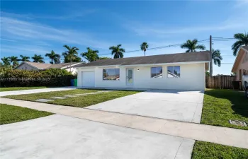 Front of home with large driveway