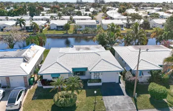 WATERFRONT-- 55 + COMMUNITY*** 2 BEDROOM/2 BATH, 1 CAR GARAGE WITH DOUBLE WIDE DRIVEWAY