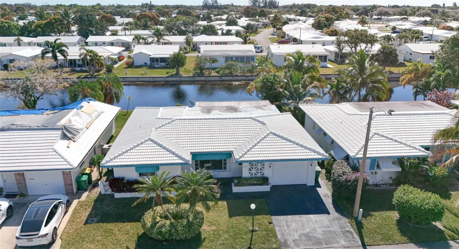 WATERFRONT-- 55 + COMMUNITY*** 2 BEDROOM/2 BATH, 1 CAR GARAGE WITH DOUBLE WIDE DRIVEWAY