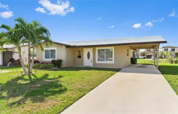Spacious carport and driveway