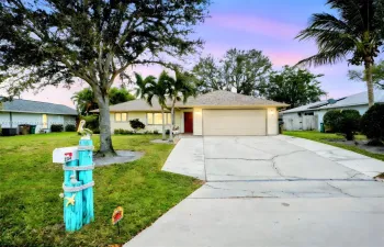 Front of property with an extended driveway