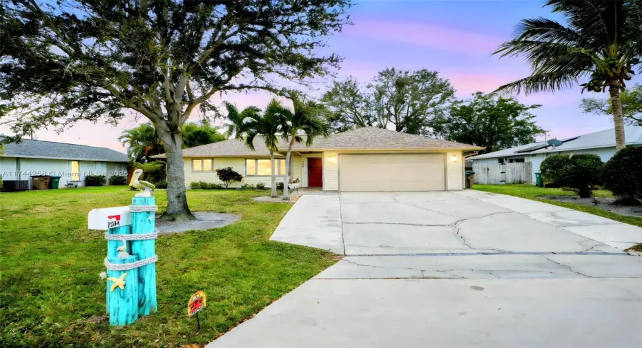 Front of property with an extended driveway