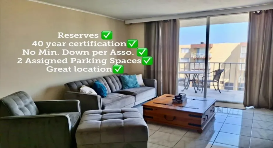 Living room overlooks garden and pool