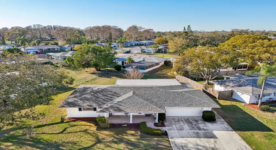 Nestled in quiet community with mature trees