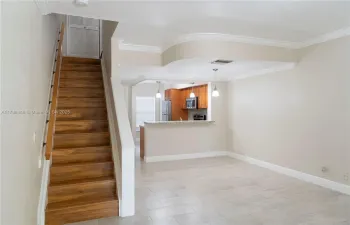 porcelain tile through out the down stairs and wood laminate all up stairs