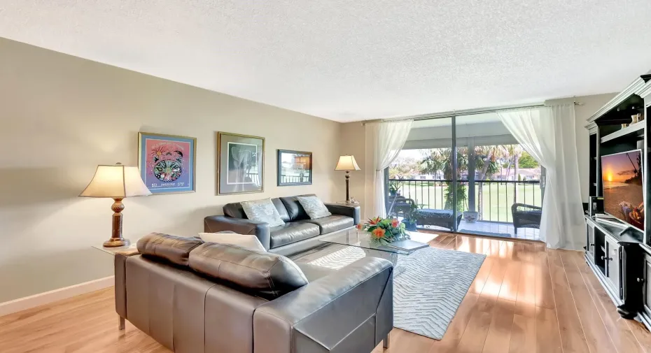 Sensational, UPDATED 2/2 boasting gorgeous luxury flooring.