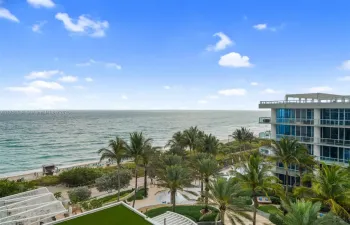 View of ocean and palms from balcony