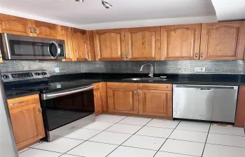 Kitchen with SS appliances