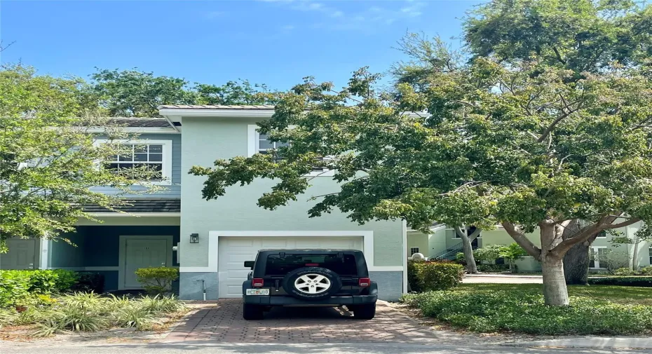Corner Unit is surrounded by mature trees and beautiful open areas