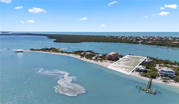 Almost one acre of prime beachfront property in North Captiva! Build your dream home or use existing plans, this is location location location!