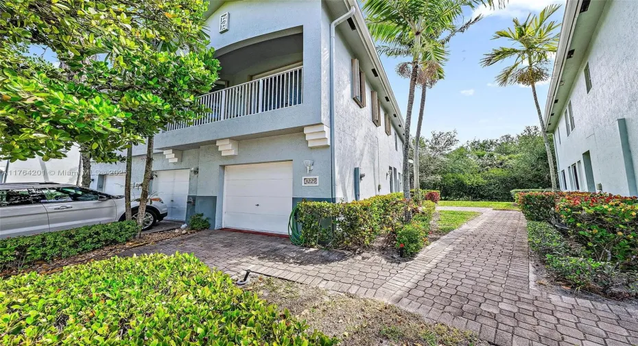  Welcome Home! End unit Townhouse with attached 1 car garage and balcony.