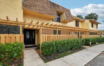 New fence / pergola style cover. Accordion shutters 2nd story.