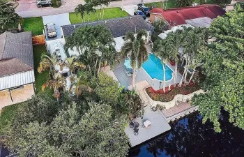 Canal Front with Pool, Hot Tub and Storage Sheds