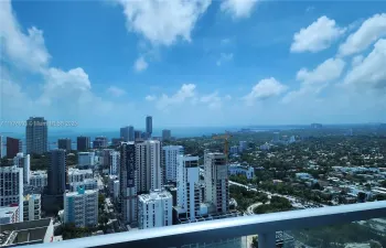 This location boasts open, unobstructed and beautiful views of the water and city. The balcony faces south. All of this plus an excellent location.