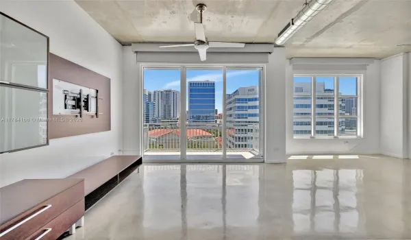 Loft style with high ceilings, polished concrete floors.