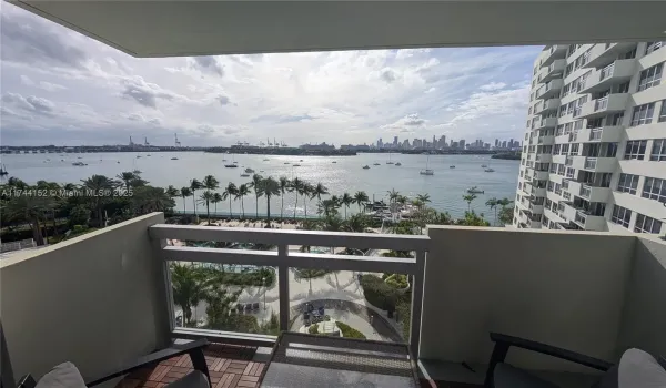 A private balcony with jaw-dropping panoramic views of Biscayne Bay and Downtown Miami—truly the best feature of this unit.