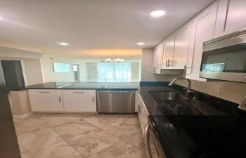 Magnificent all high end updated kitchen, granite, SS appliances, soft close white cabinets, etc.