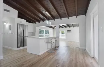 VIEW OF LIVING, KITCHEN, DINING/FLORIDA ROOMS/ OPEN CONCEPT LAYOUT