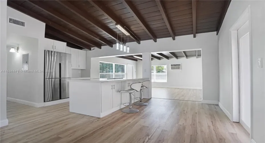VIEW OF LIVING, KITCHEN, DINING/FLORIDA ROOMS/ OPEN CONCEPT LAYOUT