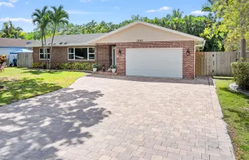 Welcoming front entrance exudes charm and sets the tone for the warmth found throughout the home