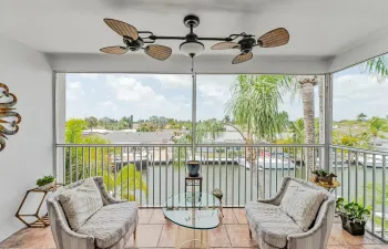 Screened balcony overlooking the water