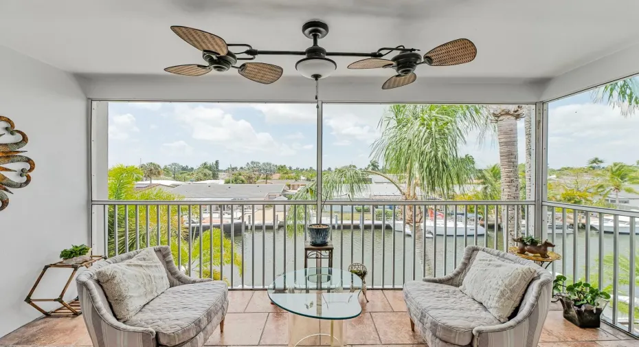 Screened balcony overlooking the water