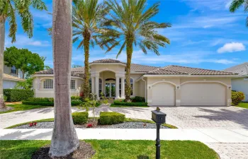 Situated on a gorgeous golf lot with breathtaking views, this 4000sf residence has been completely remodeled, including new roof 2022 and impact glass.